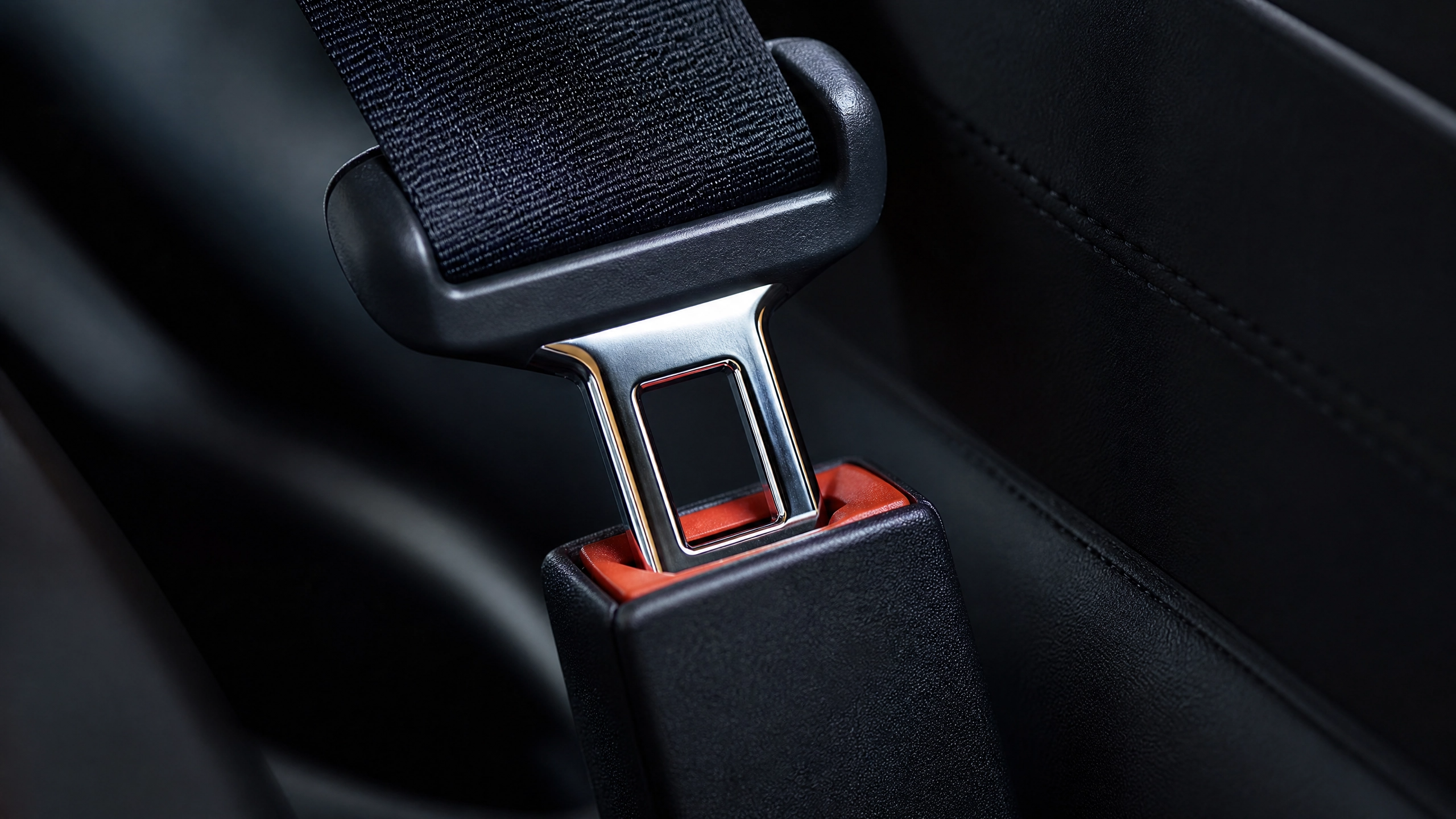 Close up of a secure five-point harness buckle on a baby car seat