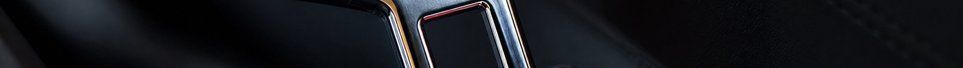 Close up of a secure five-point harness buckle on a baby car seat