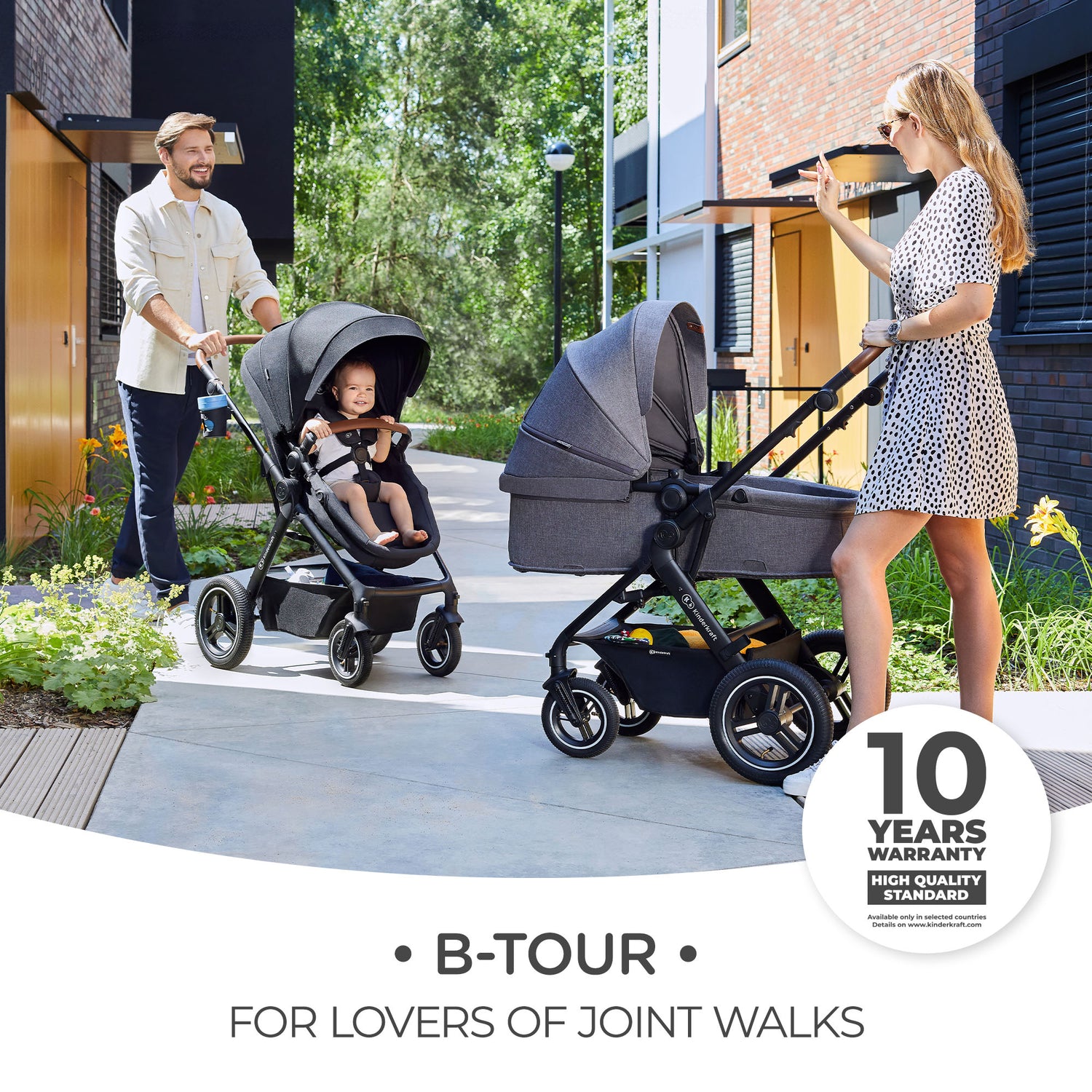 Parents with Kinderkraft Travel System B-TOUR 3 IN 1 on sunny day