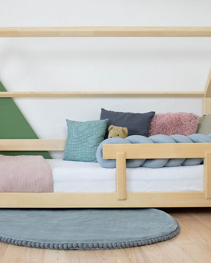 House‑shaped frame bed inviting creativity and personalization