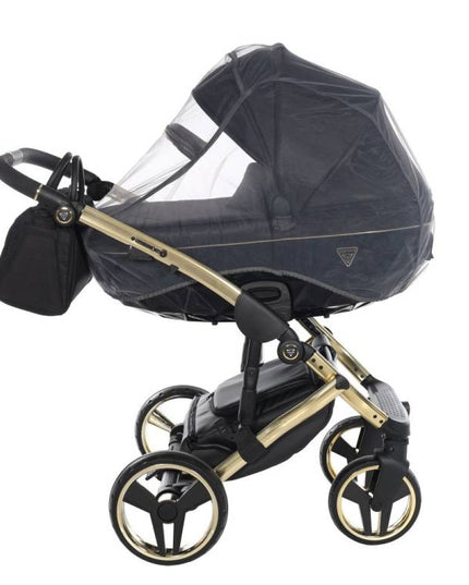 Parent pushing Junama stroller outdoors