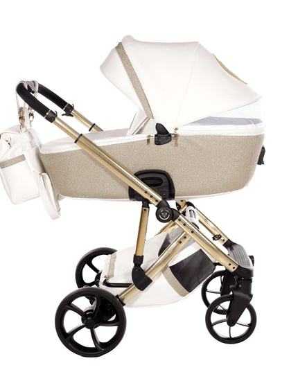 Junama TERMO GLITTER ECO Stroller in stylish gold and white design with a comfortable baby seat and storage bag.