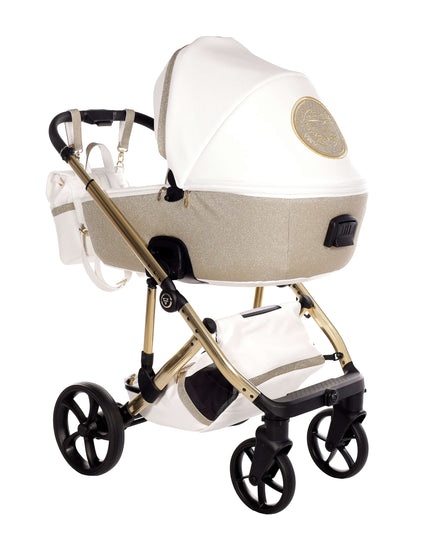 Junama TERMO GLITTER ECO Stroller in elegant gold and white design with spacious bassinet and stylish wheels.