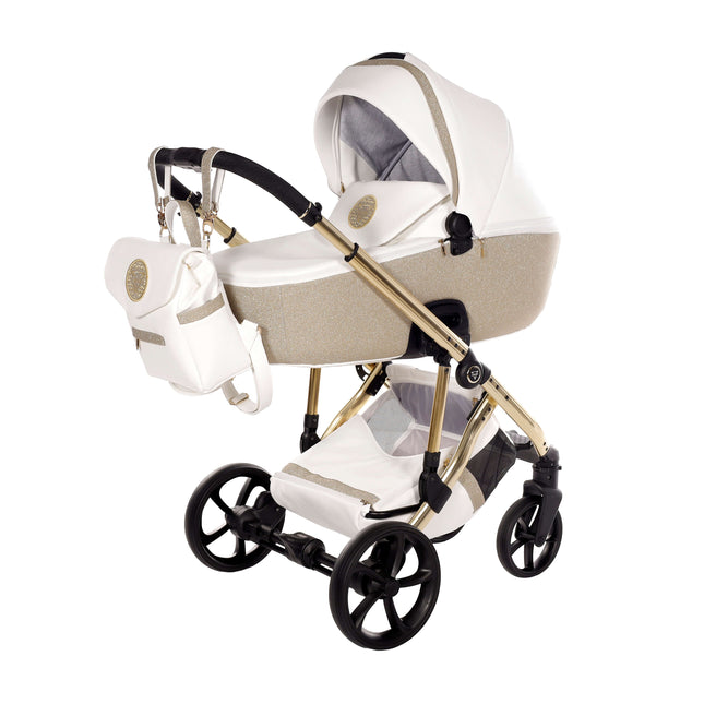 Junama TERMO GLITTER ECO Stroller featuring a stylish design with a luxurious gold finish, perfect for modern parents.