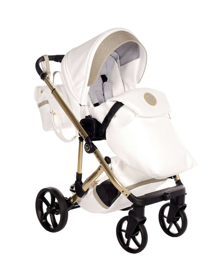 Junama TERMO GLITTER ECO stroller in white with gold accents, perfect for stylish outings with your baby.