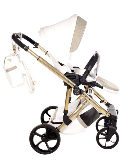 Junama TERMO GLITTER ECO Stroller in white and gold, showcasing its stylish design and functionality.