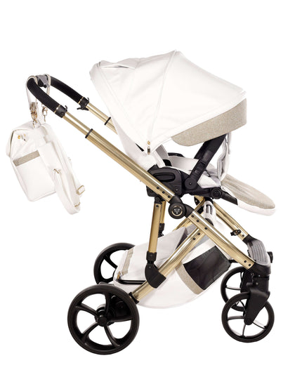 Junama TERMO GLITTER ECO stroller in white with gold frame, stylish design and matching diaper bag.