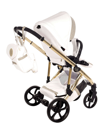 Stylish Junama TERMO GLITTER ECO stroller in white with gold accents and a matching diaper bag.