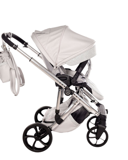 Junama TERMO GLITTER ECO Stroller in silver color, featuring a sleek design and adjustable canopy.