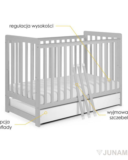 Convertible crib with protective barrier