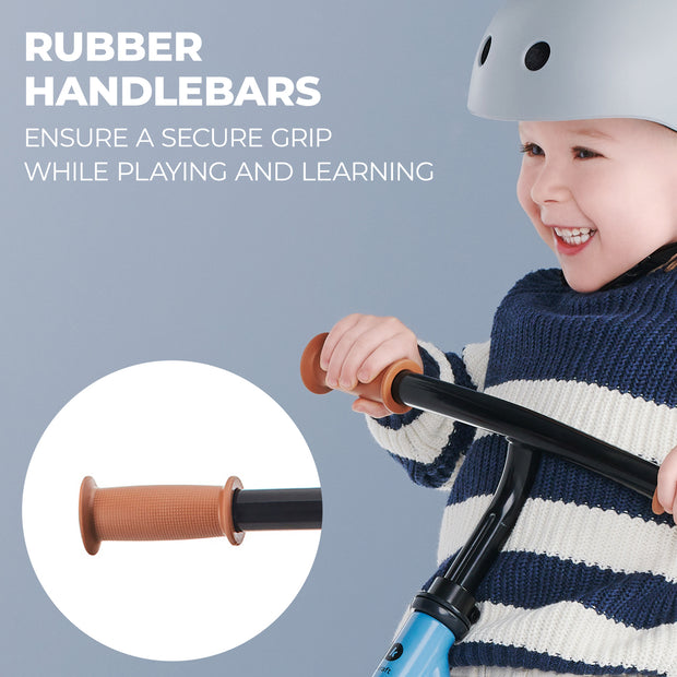 Child gripping rubber handlebars of Kinderkraft Balance Bike 2WAY NEXT.
