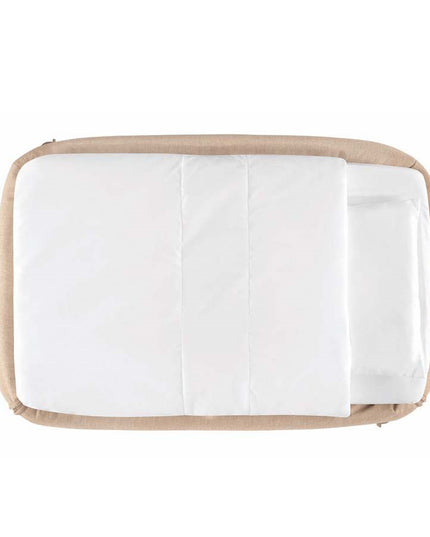 Drop-side baby cot