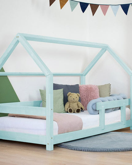 Playful house‑shaped bed frame with single safety barrier