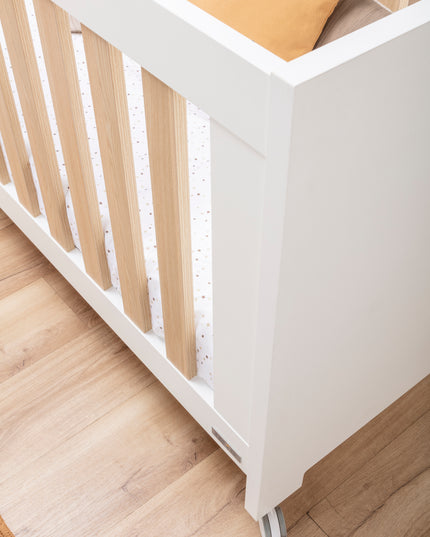 ikid compact co‑sleeping cot for nursery