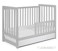 Baby‑safe finishes on gray crib