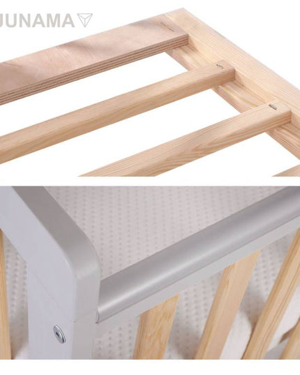 Gray crib with storage drawer