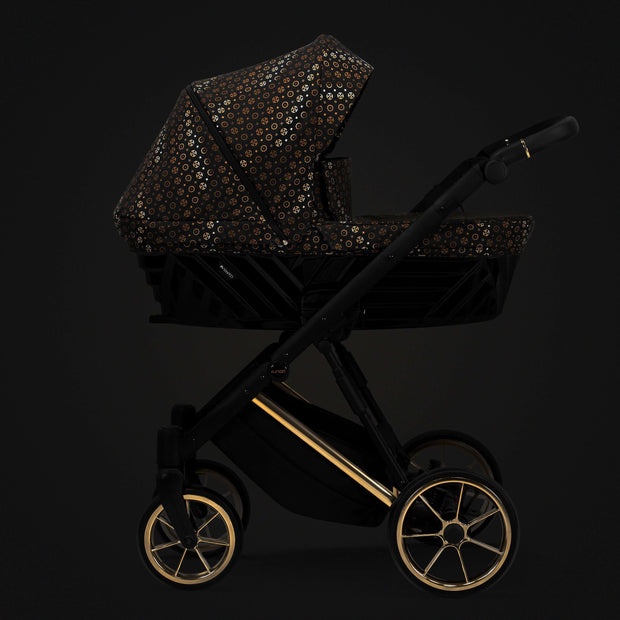 Side view of the sophisticated Kunert Stroller IVENTO with golden accents and spacious basket