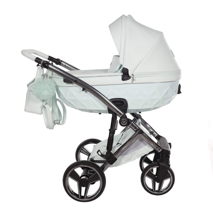 Junama CANDY 2.0 stroller in mint color with diamond-shaped design and eco-leather accents, showcasing style and functionality.