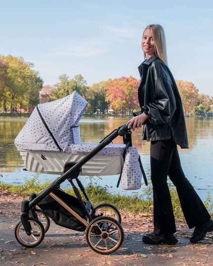 Elegant woman with the Kunert Ivento Stroller in the park