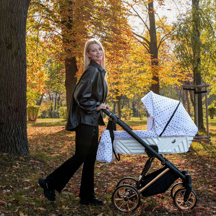 Elegant woman with the Kunert Ivento Stroller in the park