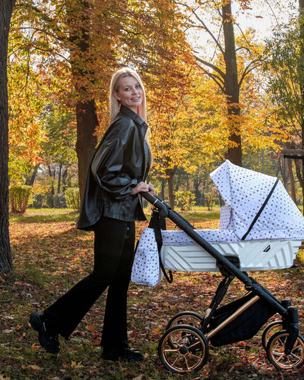 Elegant woman with the Kunert Ivento Stroller in the park