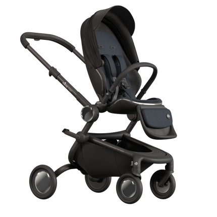 MIMA Creo Stroller in black with folded canopy, side view, illustrating compact and versatile stroller design.