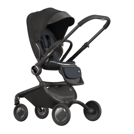 MIMA Creo Stroller in black, mother-facing position, perspective view, showcasing adjustable seating.