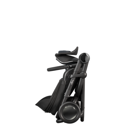 MIMA Creo Stroller in black, fully folded, side view, illustrating compact and easy-to-store design.