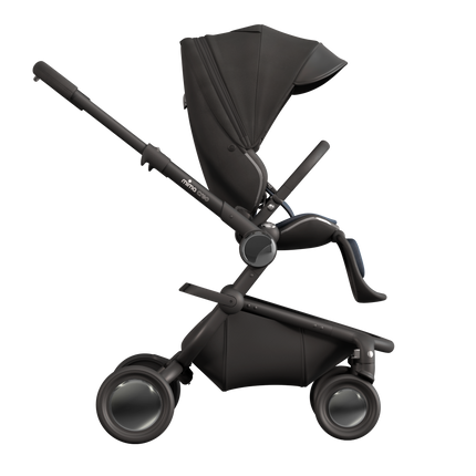 MIMA Creo Stroller in black with zipped canopy, side view, focusing on sleek and modern design.