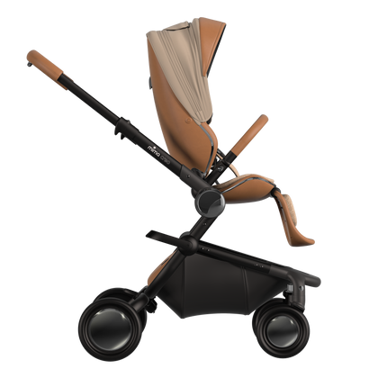 MIMA Creo Stroller in mocha, side view with folded canopy, emphasizing compact and stylish design.