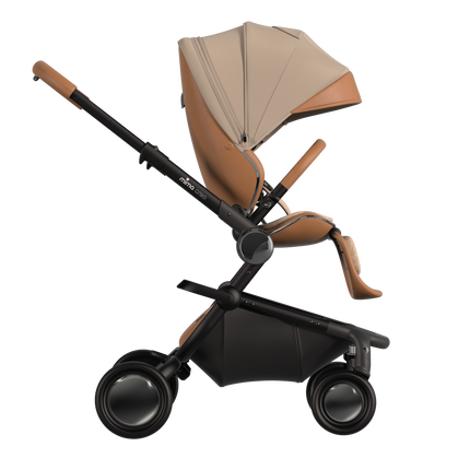 MIMA Creo Stroller in mocha, side view with unzipped canopy, highlighting ergonomic and modern design.