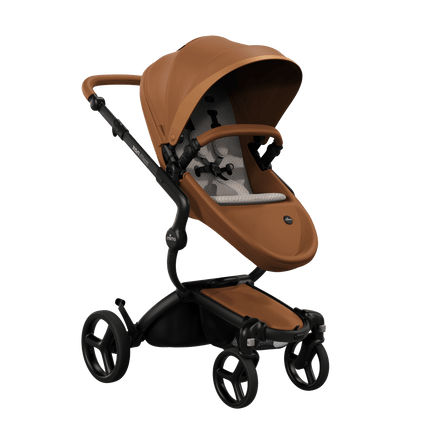 Mima XARI MAX stroller with a camel seat and sandy beige pad on a black chassis, featuring a sleek design.