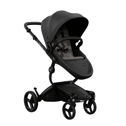 Mima XARI MAX stroller with a black seat and ash brown pad on a black chassis, featuring a sleek design.