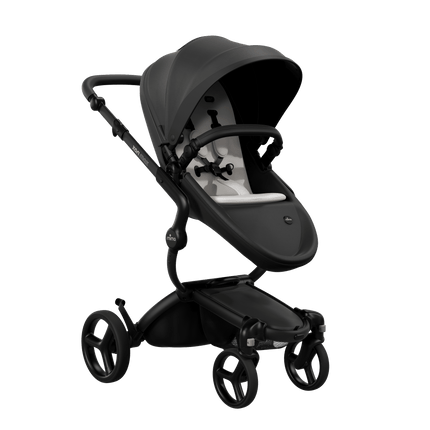 Mima XARI MAX stroller with a black seat and white pad on a black chassis, featuring a sleek design.