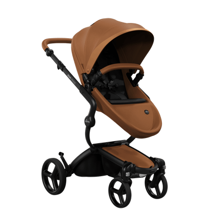 Mima XARI MAX stroller with a camel seat and XXXXXXXXX pad on a black chassis, featuring a sleek design.