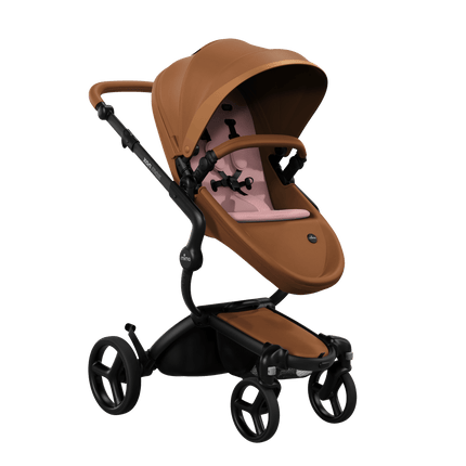 Mima XARI MAX stroller with a and camel seat pad on a black chassis, featuring a sleek design.