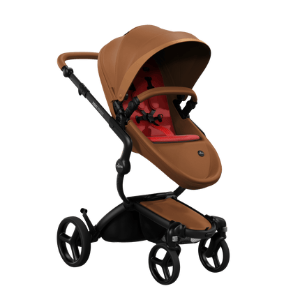 Mima XARI MAX stroller with a camel seat and red pad on a black chassis, featuring a sleek design.