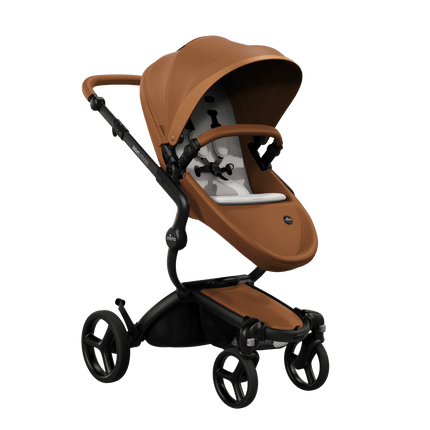 Mima XARI MAX stroller with a camel seat and White pad on a black chassis, featuring a sleek design.