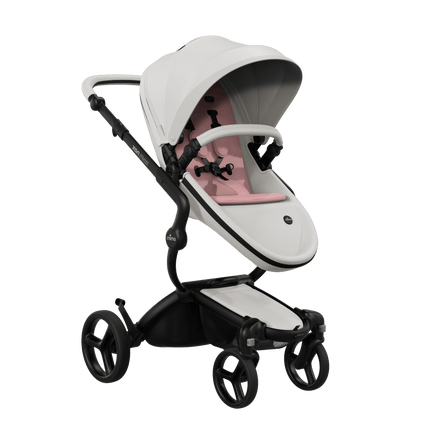 Mima XARI MAX stroller with black chassis, snow white seat, and pink pad, side view.