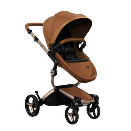 Mima XARI MAX stroller with a camel seat and black pad on a champge chassis, featuring a sleek design.