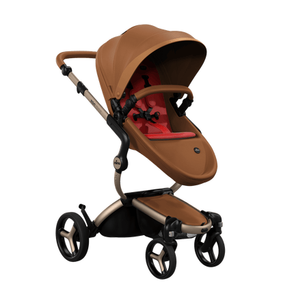 Mima XARI MAX stroller with a camel seat and Red pad on a champge chassis, featuring a sleek design.