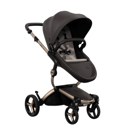 Mima XARI MAX stroller with a chocolate brown seat and sandy beige pad on a champge chassis, featuring a sleek design.