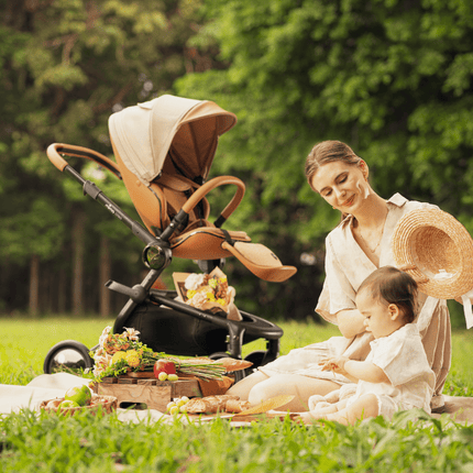 Mima Creo Stroller Mocha at a garden snack time with mom and baby.