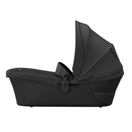 Side view of Mima XARI MAX carrycot in black