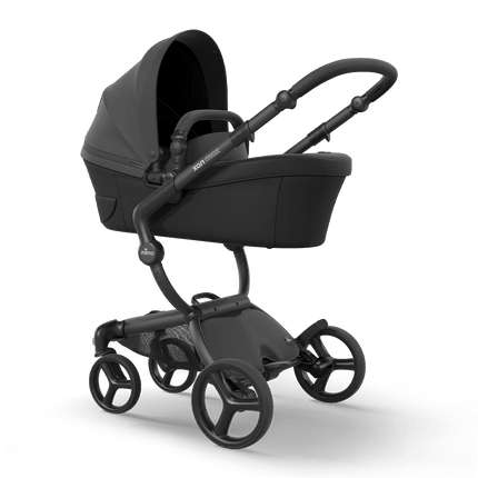 Mima XARI MAX stroller with carrycot in black, rear perspective