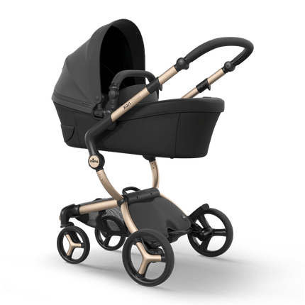 Mima XARI MAX stroller with carrycot in black, side perspective