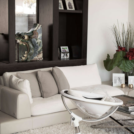 Contemporary living room with Mima Moon High Chair and chic decorations.