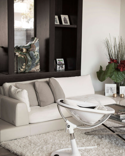 Contemporary living room with Mima Moon High Chair and chic decorations.