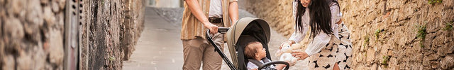 Family with baby inside the Espiro Only Way Stroller