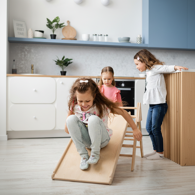 Kids playing on wooden slide